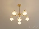 Gold Chandelier Centered Hero.webp