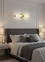 Gold_Wall_Sconce_Bedroom_Installation.webp