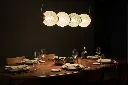 Linear_Pendant_Dining_Table_Closeup.webp